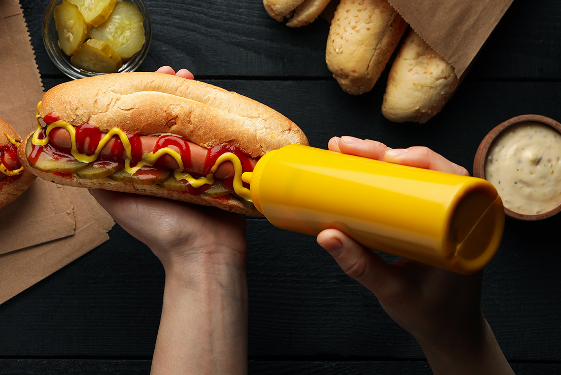 image of hot dog with ketchup and mustard